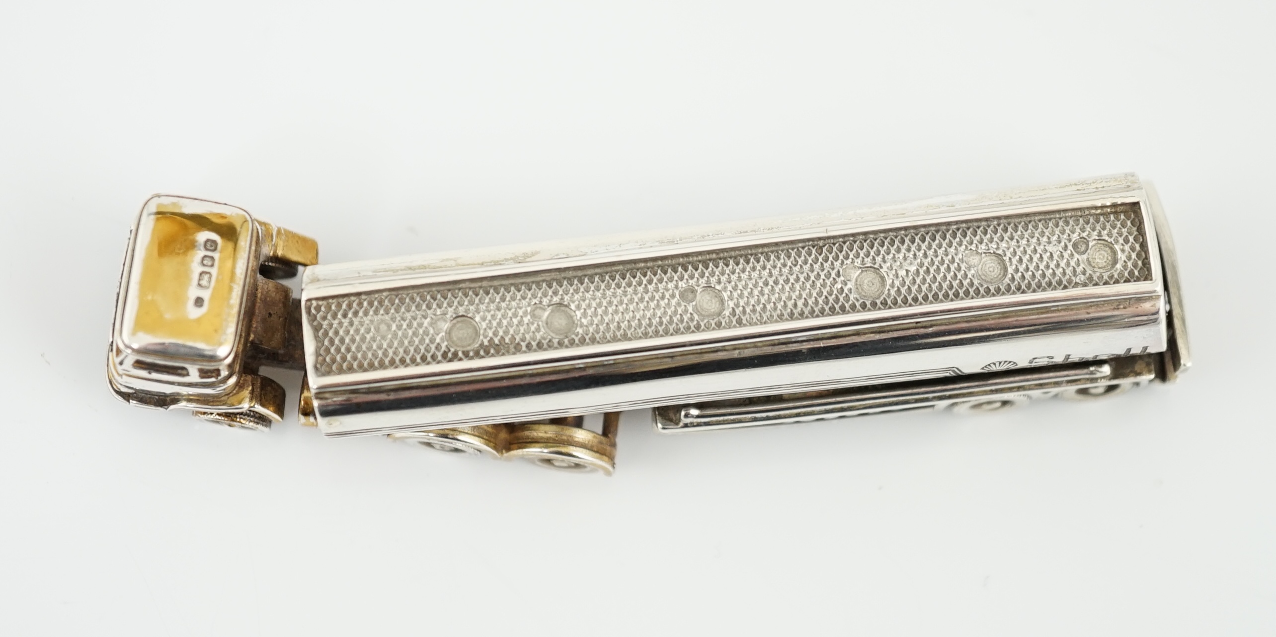 An Elizabeth II parcel gilt silver miniature model of a Shell oil tanker, by Theo Fennell